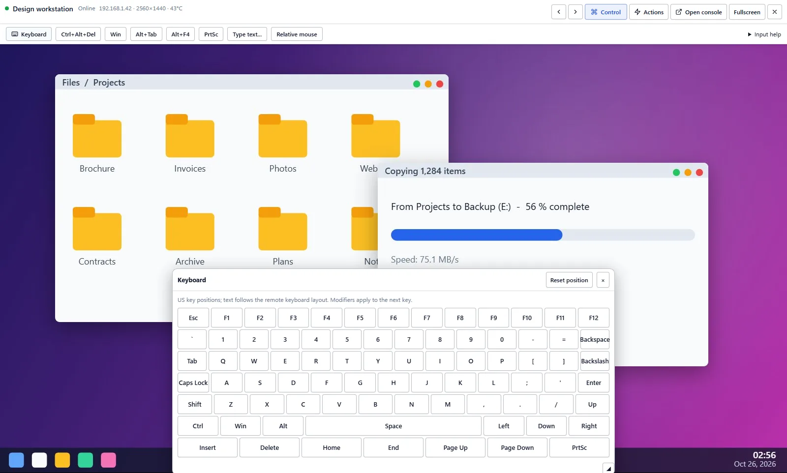 One machine live in the browser: its keyboard and mouse taken, and a keyboard on the screen.